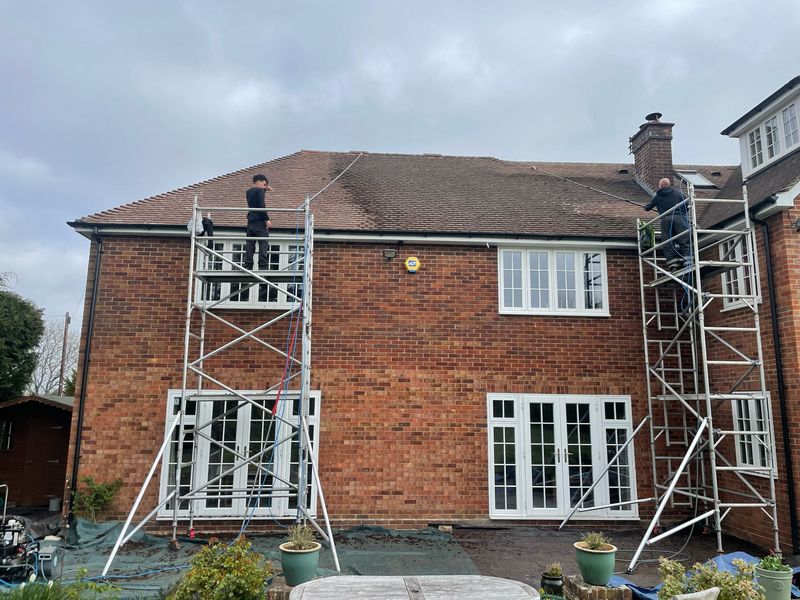 Roof cleaning carried out safely from scaffold towers by The Roof Moss Cleaners in Eaton Bray